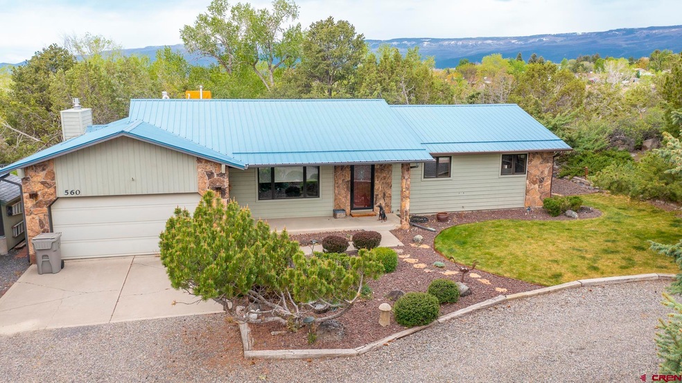 560 NE 4th St, Cedaredge, CO 81413 - photo 1