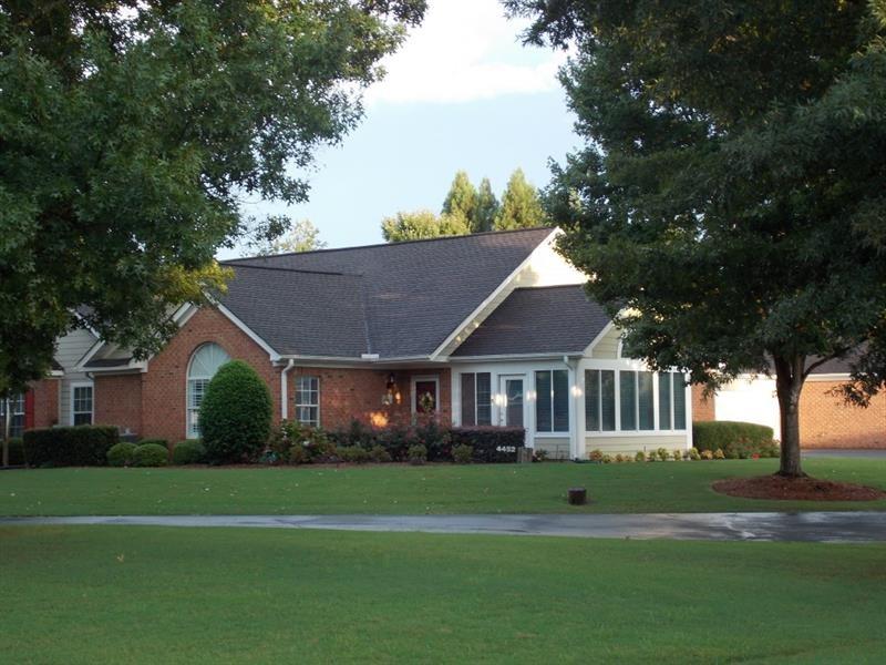 4452 Orchard Trace...surrounded by trees & level y