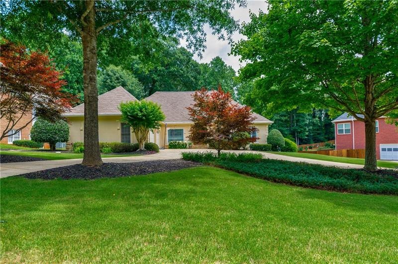 Beautiful landscaping and circular drive