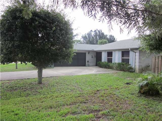 Exterior Front. Large Corner Lot, Side Entrance Ga