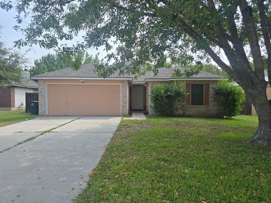 Ranch-style house with brick siding, concrete driveway, and a garage