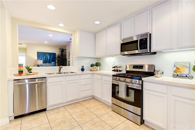 New marble counter tops and stainless steel applia