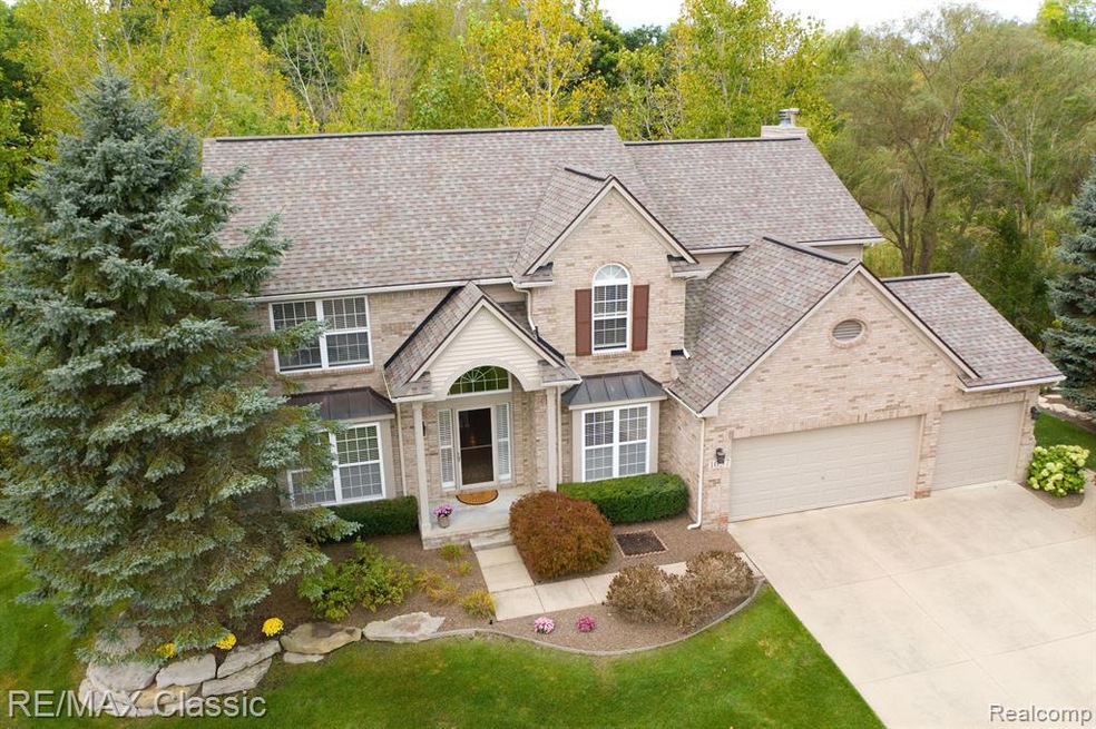 Stately South Lyon home located on a cul-de-sac.