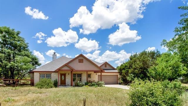 Rare one story, three bedroom under 400K on 2 acres in Dripping Springs ISD.