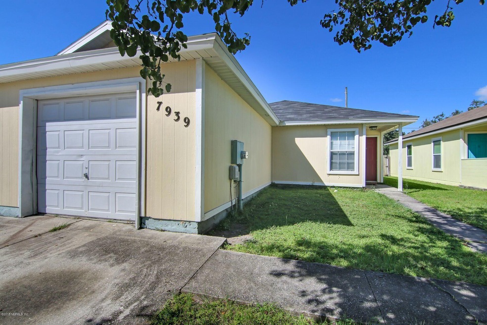 7939 Cherry Blossom Dr N, Jacksonville, FL 32216 - photo 1