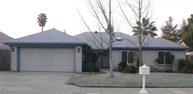 Front of house facing north, newer roof, extra wid