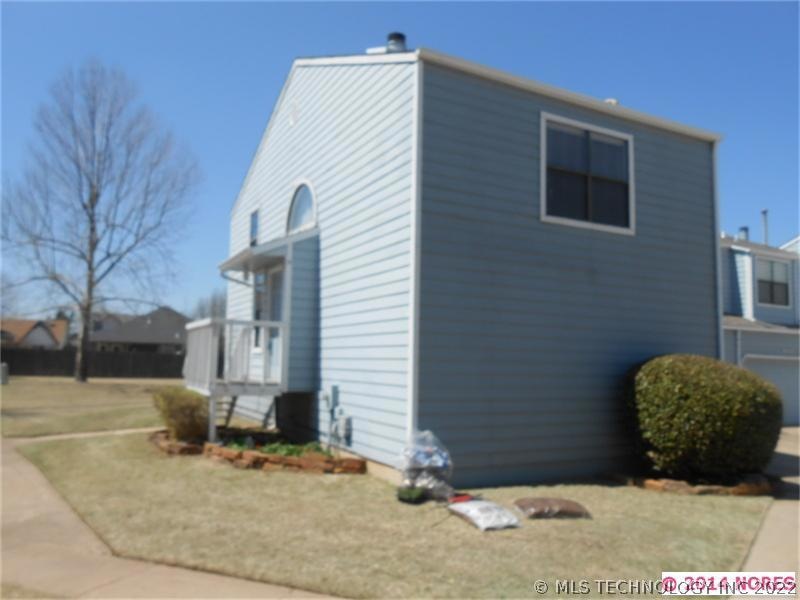 Desirable corner unit with private patio and open