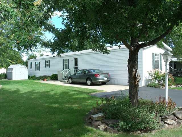 Exterior Front. Very well manicured around the ent