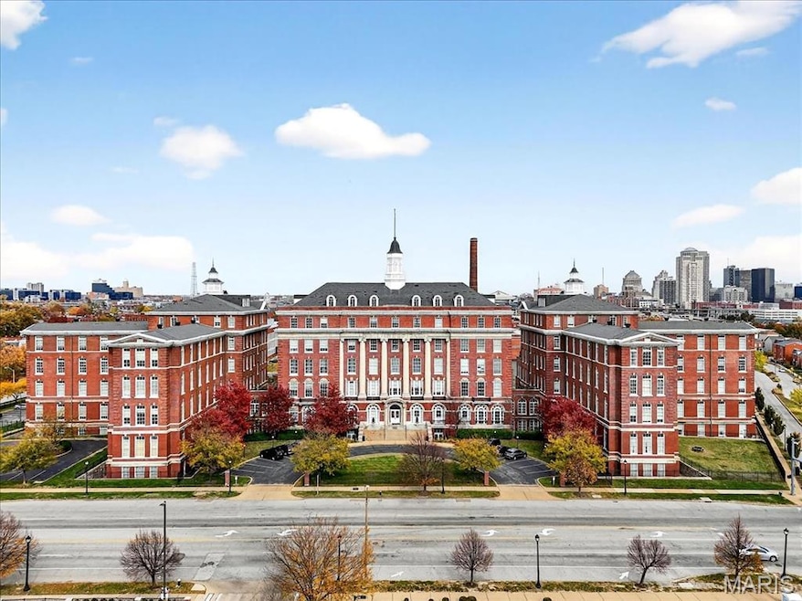 View of building exterior featuring a view of skyline
