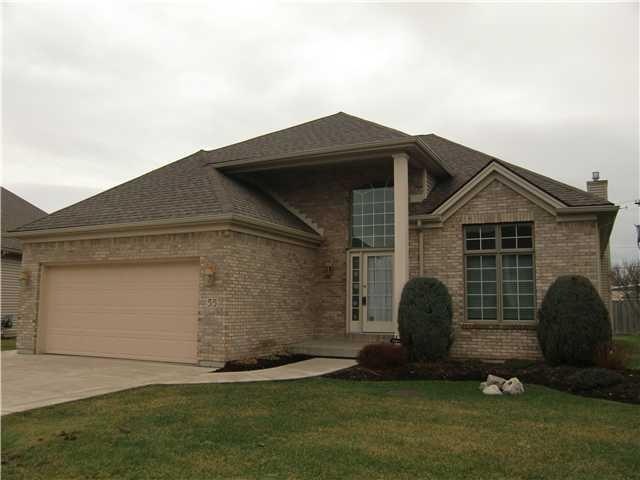 Exterior Front. Patio Home with attached 2.5 car g