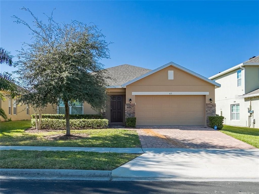 Enjoy upgraded brick pavered driveway and flagston