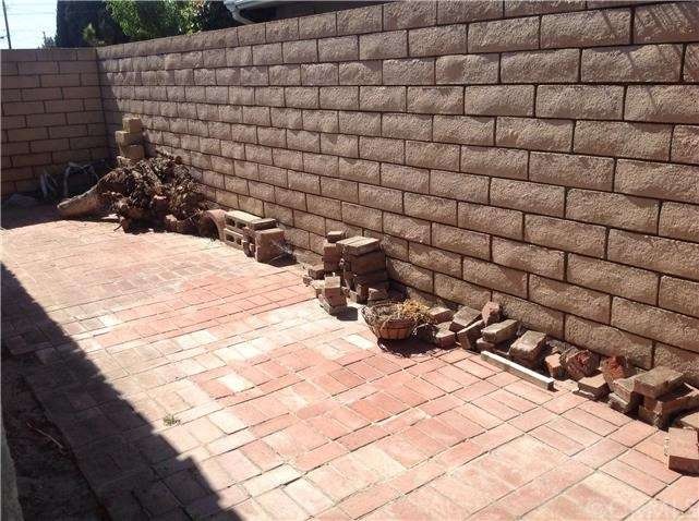 Side patio...storage, gardening bench...your ideas