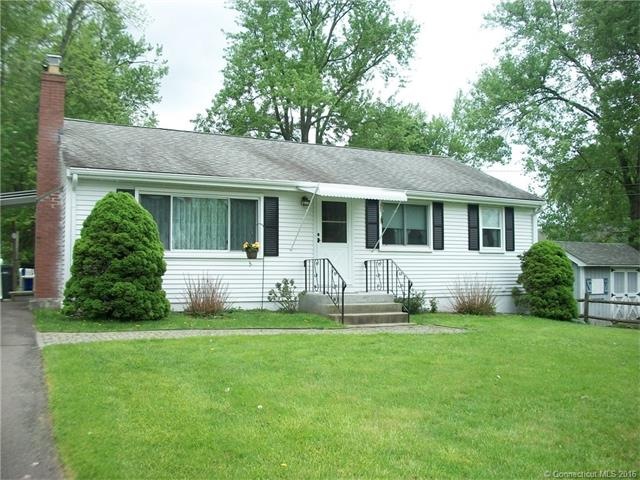 Front view of this lovely ranch located on cul de 