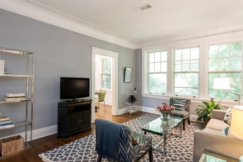 Oversized Living Room with Full wall of Windows, 1