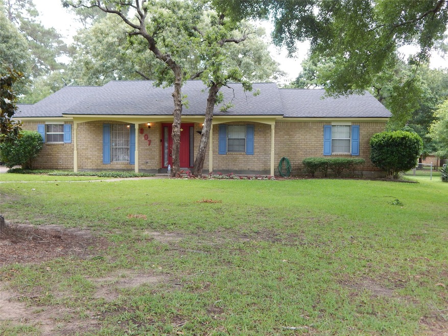 807 Harvey Dr, Pinehurst, TX 77362 - photo 1
