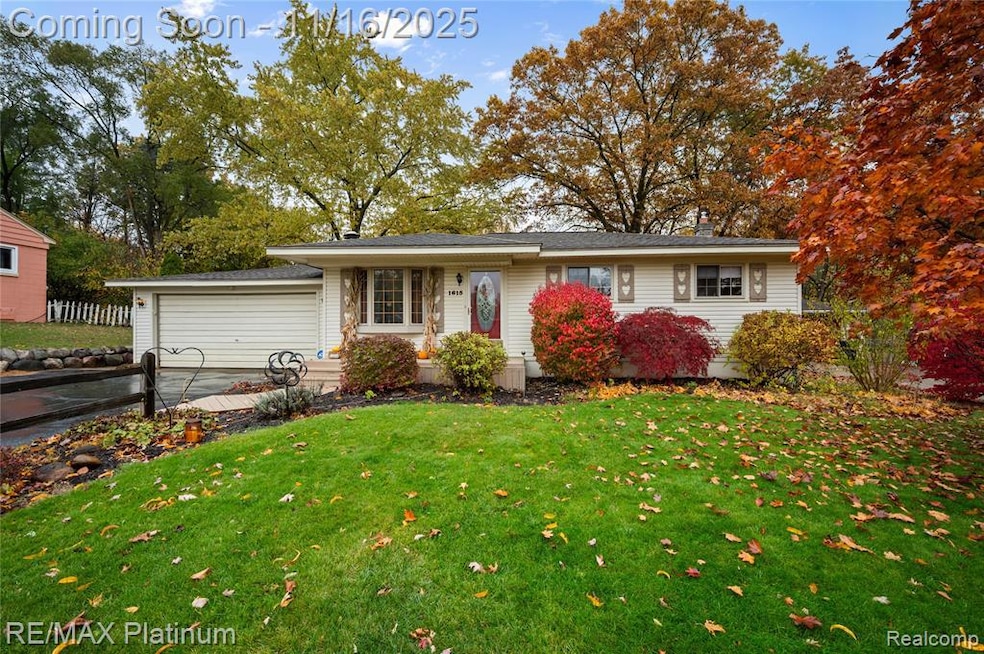 Ranch-style house with a garage