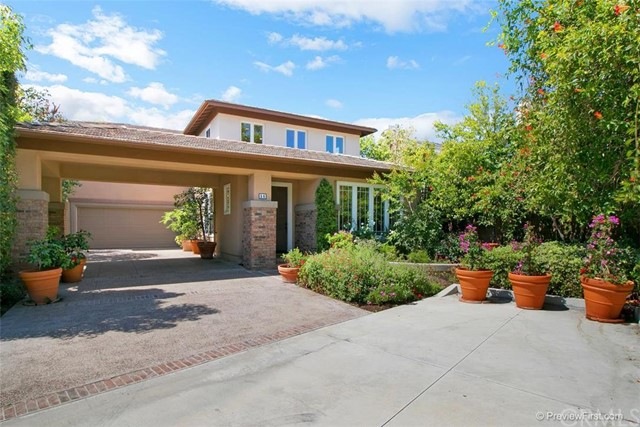This gorgeous, former model home is located on a p