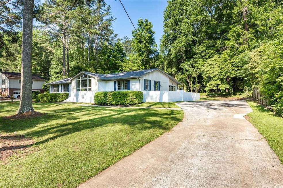 Welcoming entrance to this fabulous West Cobb ranc