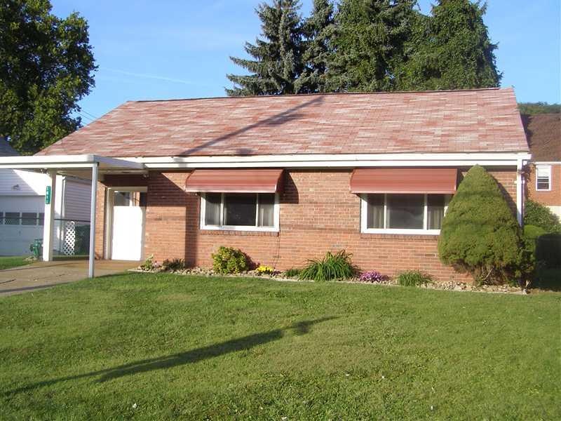 Exterior Front. New awnings and landscape