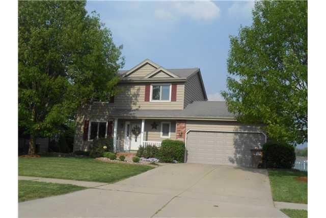 Exterior Front. Oak Trees on each side provide sha