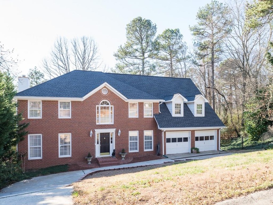 Handsome Brick Traditional with Circular Driveway!