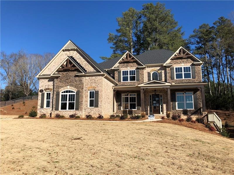 Georgous 4 Side Brick~3 Car Side Entry Garage~Walk