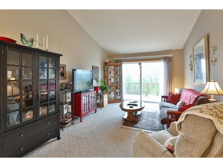 The living room is light and bright with its vault