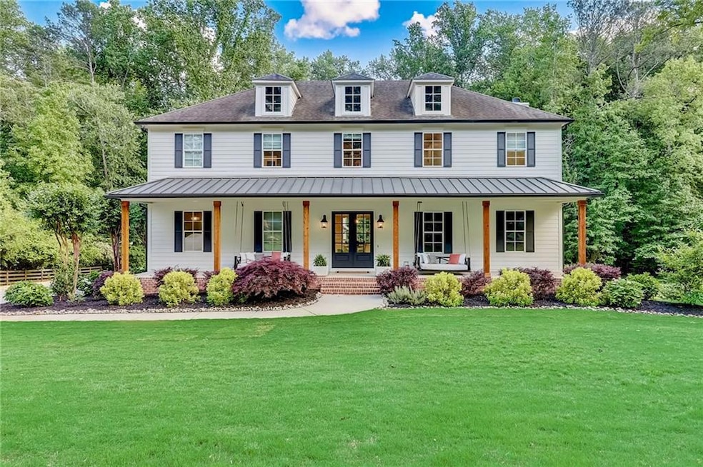 Modern farmhouse with covered porch, a standing se