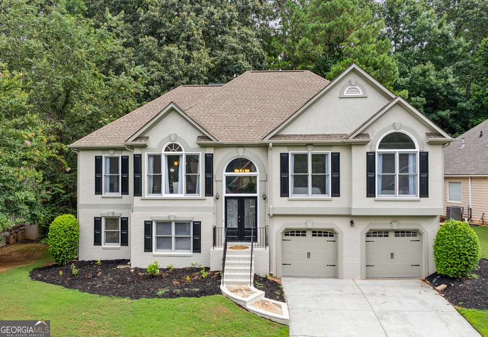 Welcome home to this beautifully renovated top-to-