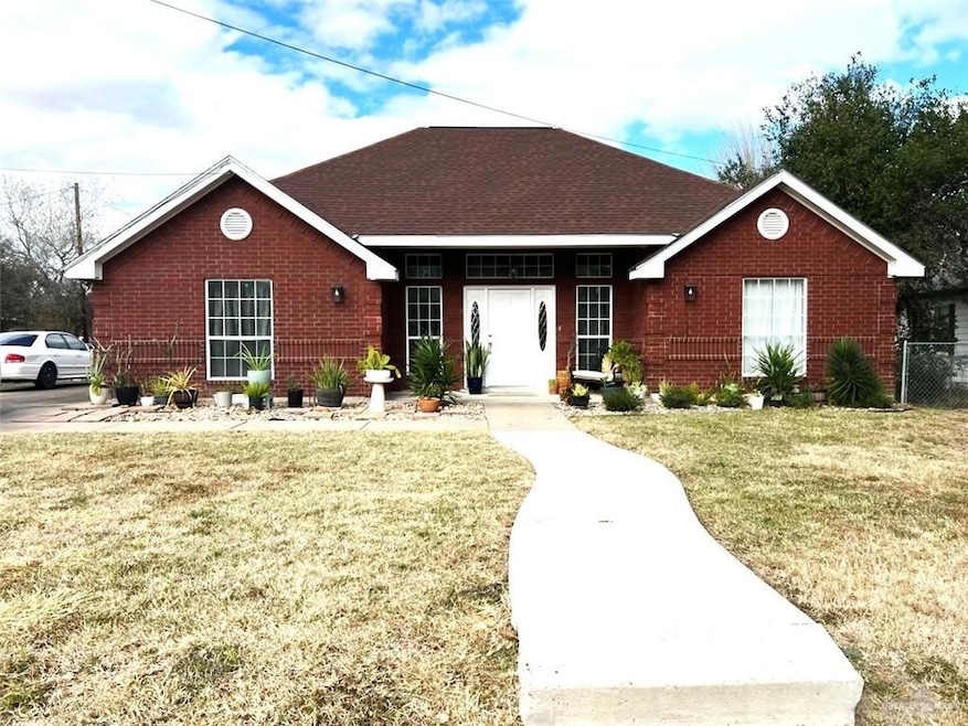 Ranch-style house with a front lawn