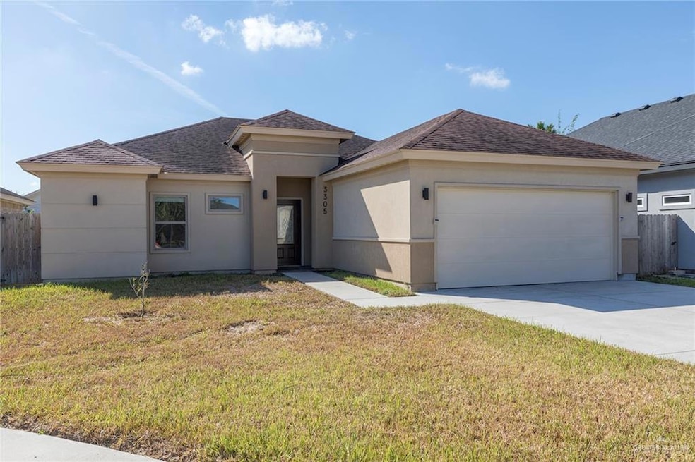 View of front of property with a shingled roof, concrete driveway, a garage, and stucco siding