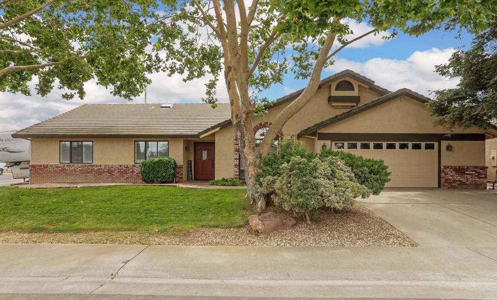 Front View, tall shade trees and great curb appeal!