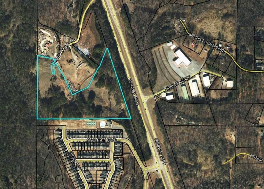 Aerial view of property's location featuring property parcel outlined