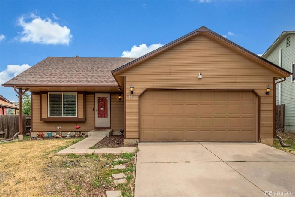 1410 S Cathay St, Aurora, CO 80017 - photo 1
