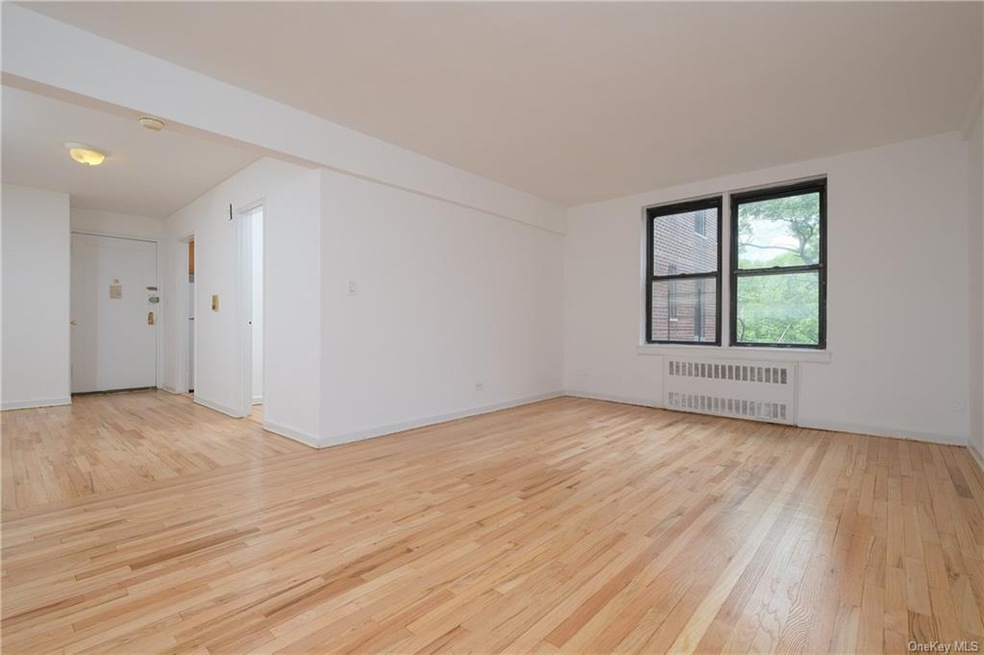 APT. 5-L  View of Living Room looking west w/ dire