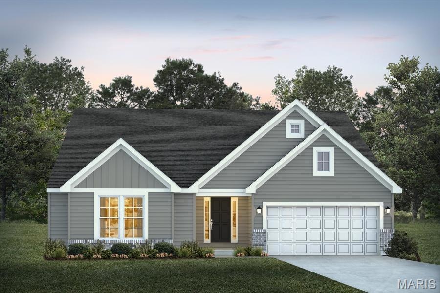 View of front of property featuring concrete driveway, roof with shingles, board and batten siding, a garage, and a front yard
