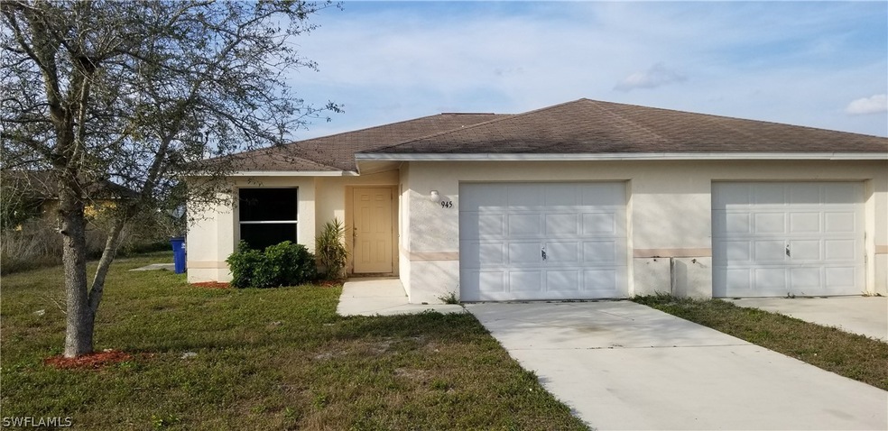 945 Chenault St, Lehigh Acres, FL 33974 - photo 1