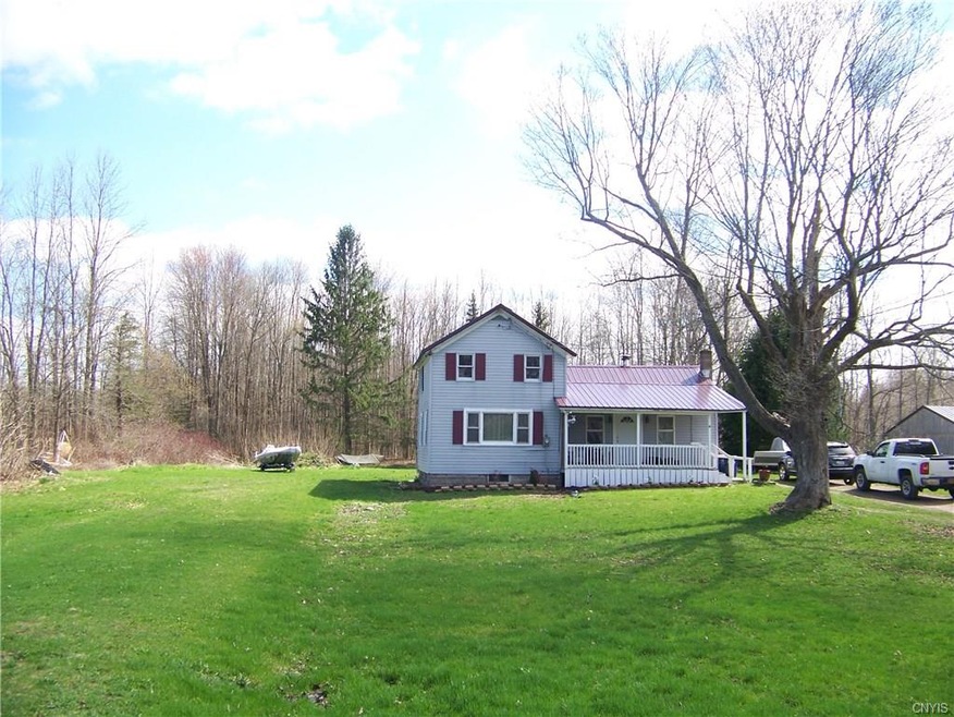 This great lot (almost a full acre!) houses this 2