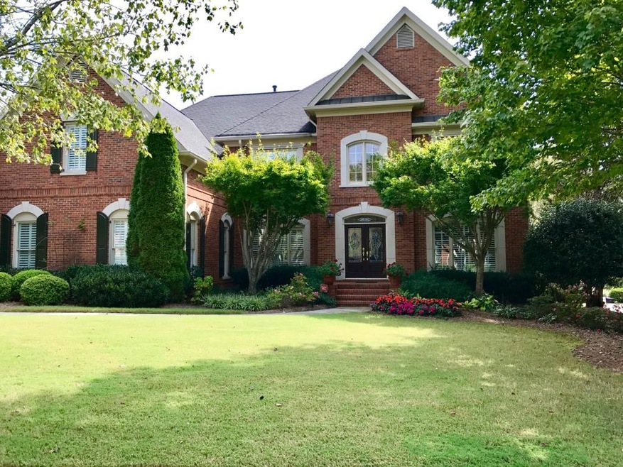 Quality, custom, executive, all-brick home with 6 