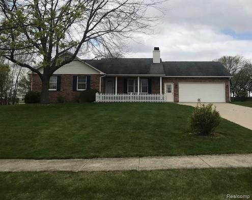 Front of Home showing sidewalk going through subdi
