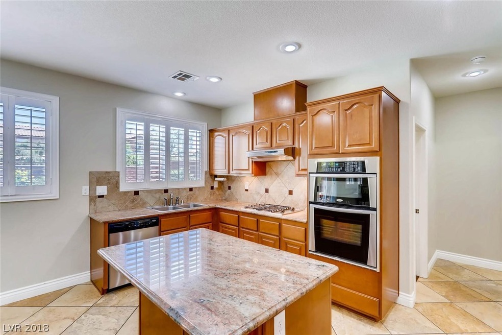 Kitchen with Island SS appliances granite