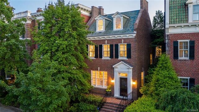 Twilight at 1635 Monument. A grand,historic 1910 home with a contemporary renovated interior.