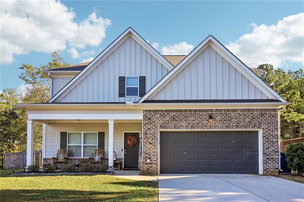 View of front of property with a front yard and a 