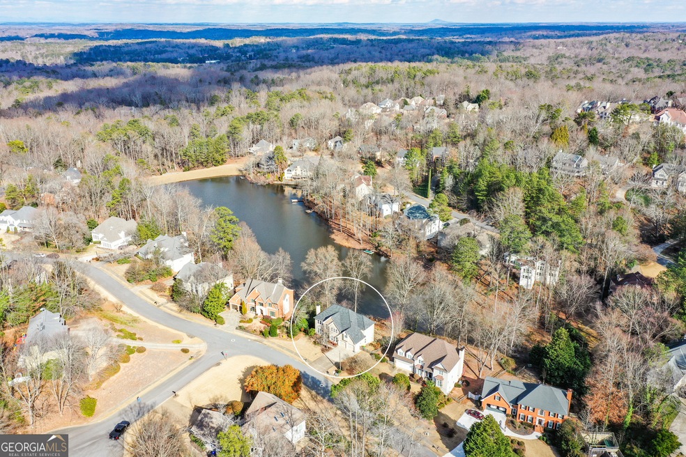 Birds eye view of property featuring a water view!