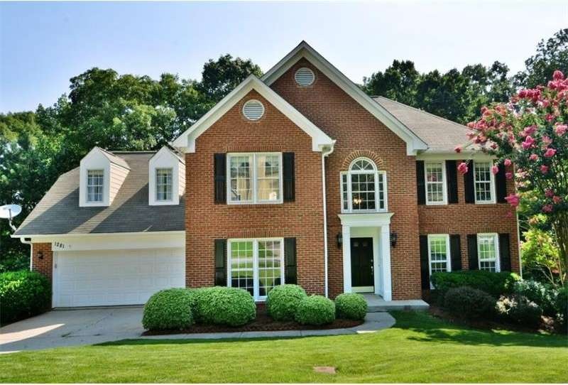 Stately Brick Front Traditional Charm!