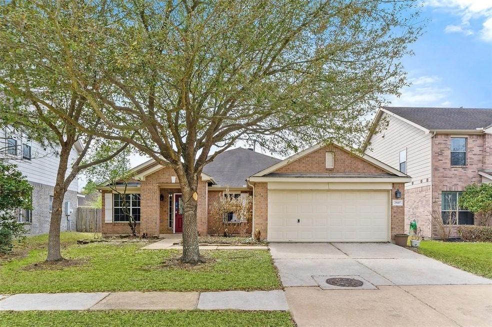 29607 S Legends Bend Ln, Spring, TX 77386 - photo 1