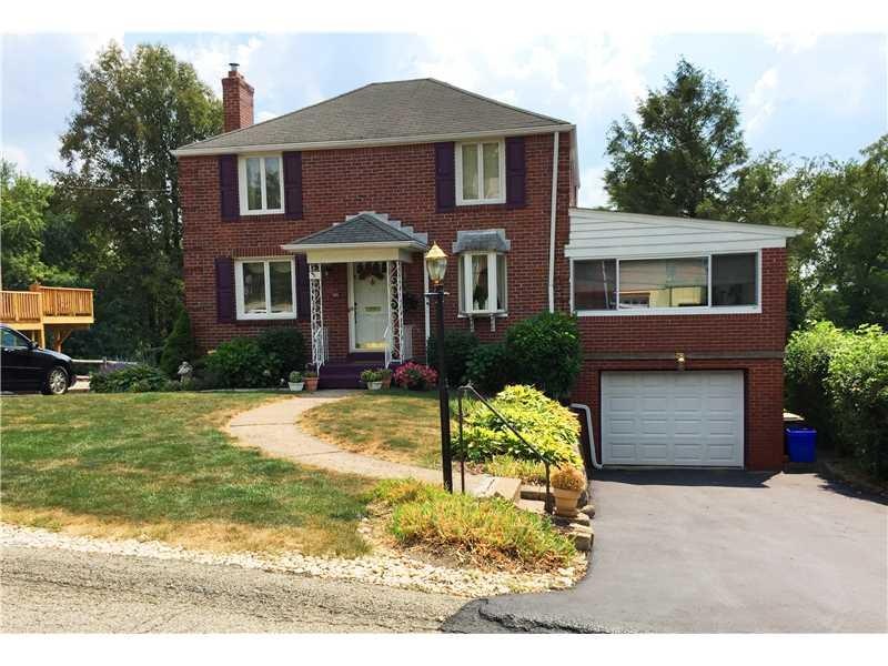 Exterior Front. Driveway on each side of house !