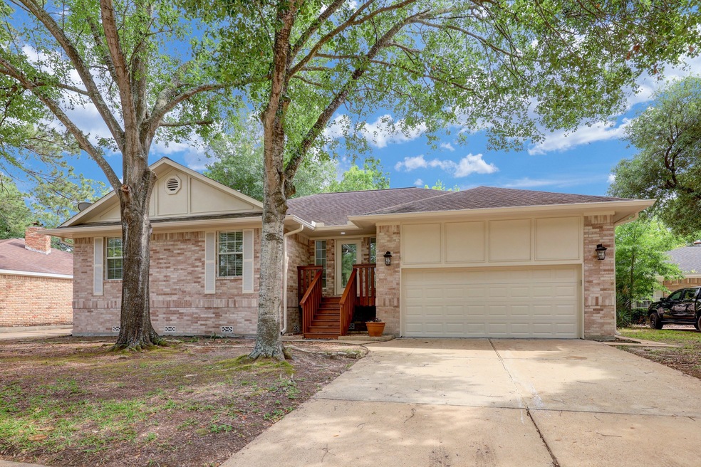 7442 Tall Pines Dr, Houston, TX 77088 - photo 1