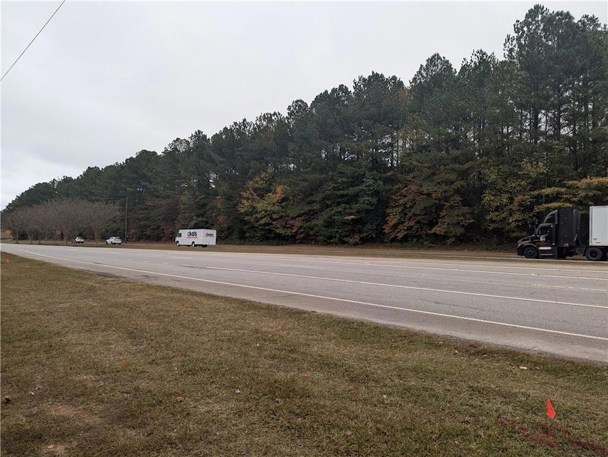 View of asphalt road with a forest view
