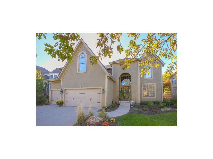 Carriage Style Garage Doors & Pro Landscaping make